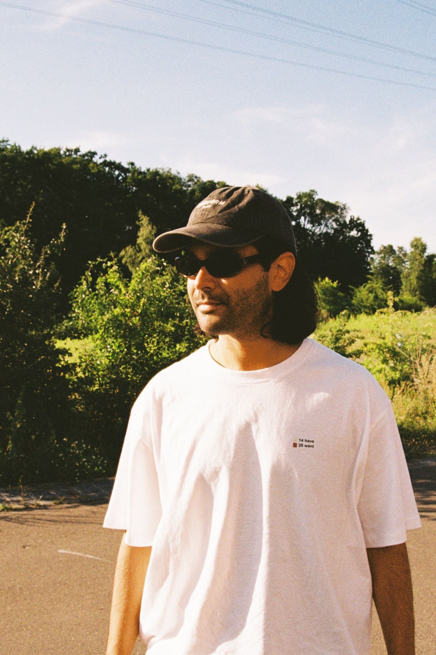 Person wearing the Have Want T-shirt outside.