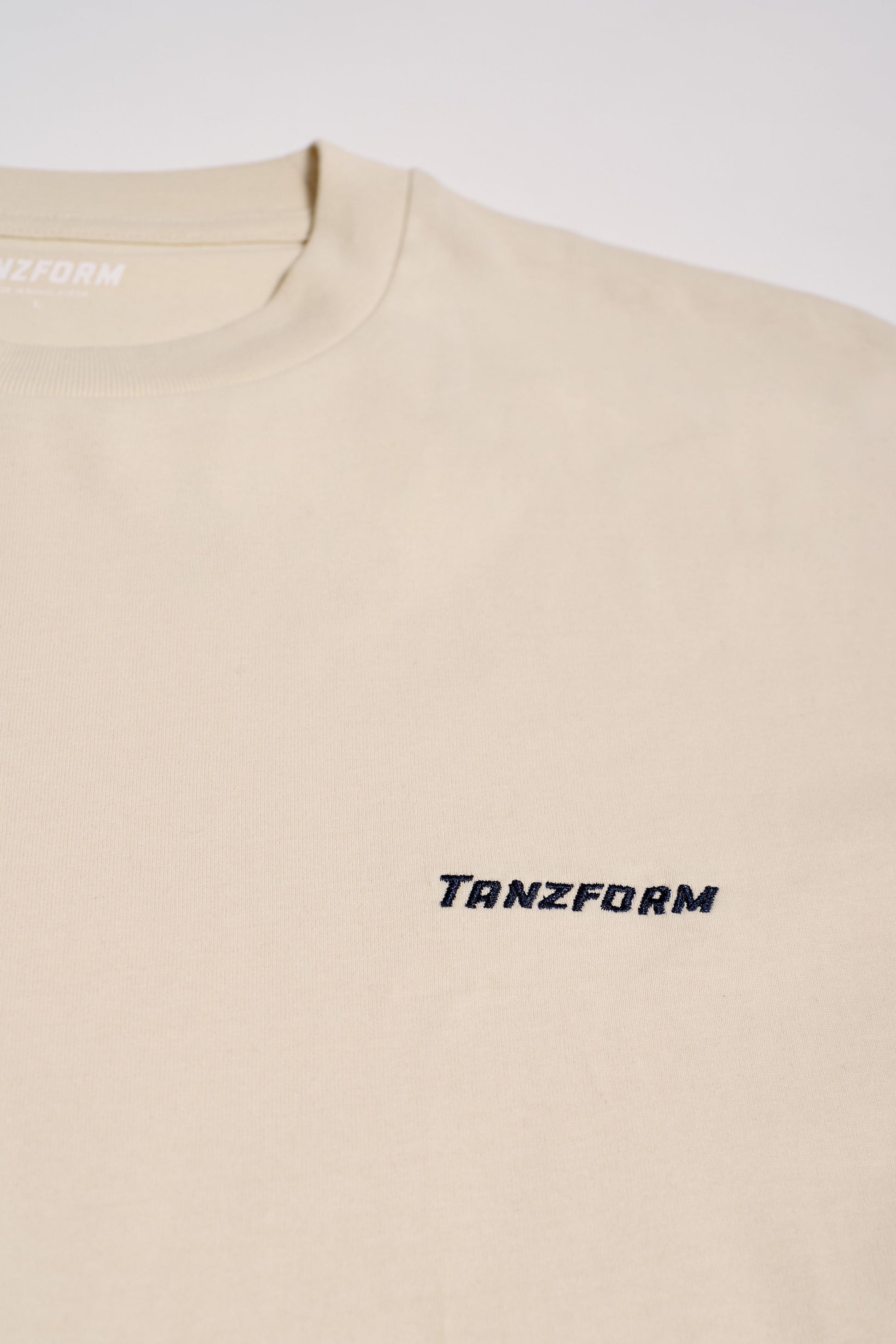 Tanzform Classic Beige T-shirt with Tanzform logo.