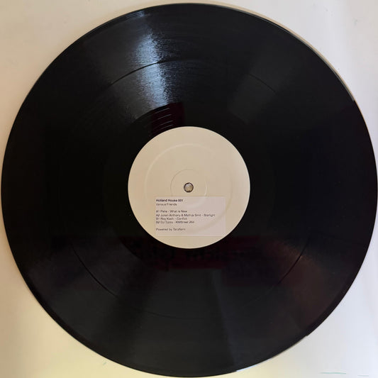 white label vinyl record with a sticker