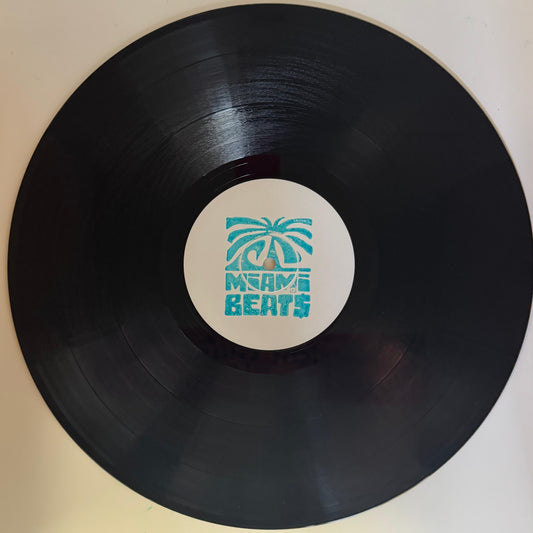 A vinyl record labeled 'Miami Beats' with a graphic of a palm tree and text on the label.