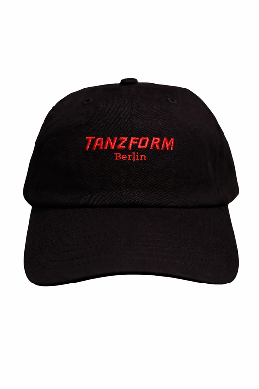 Black cap with Tanzform Berlin on it