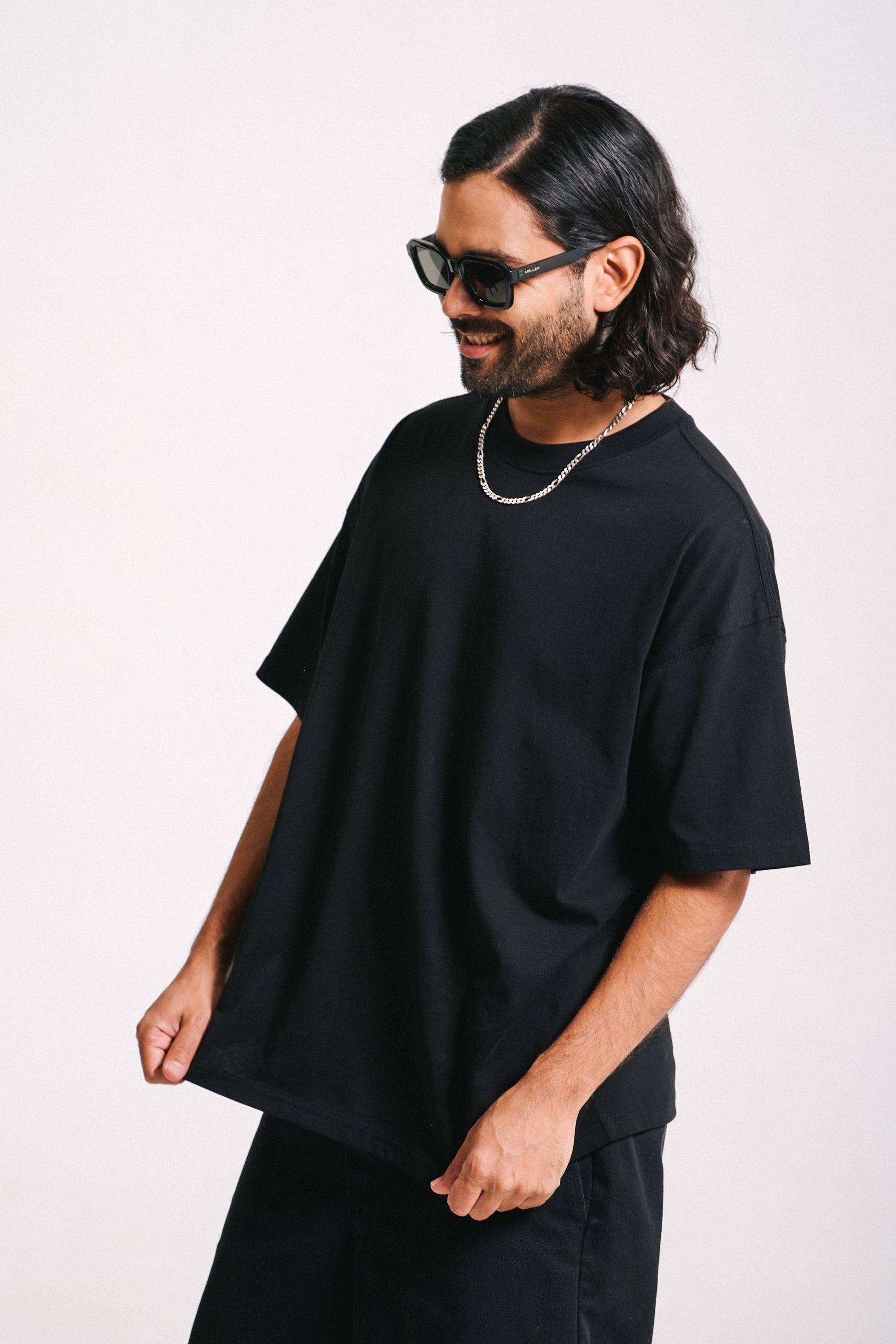 Shaque wearing the Tanzform Black tshirt