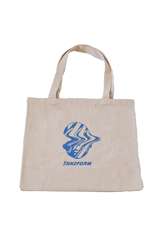 Beige tote bag with blue abstract design and 'TANZFORM' text on a white background