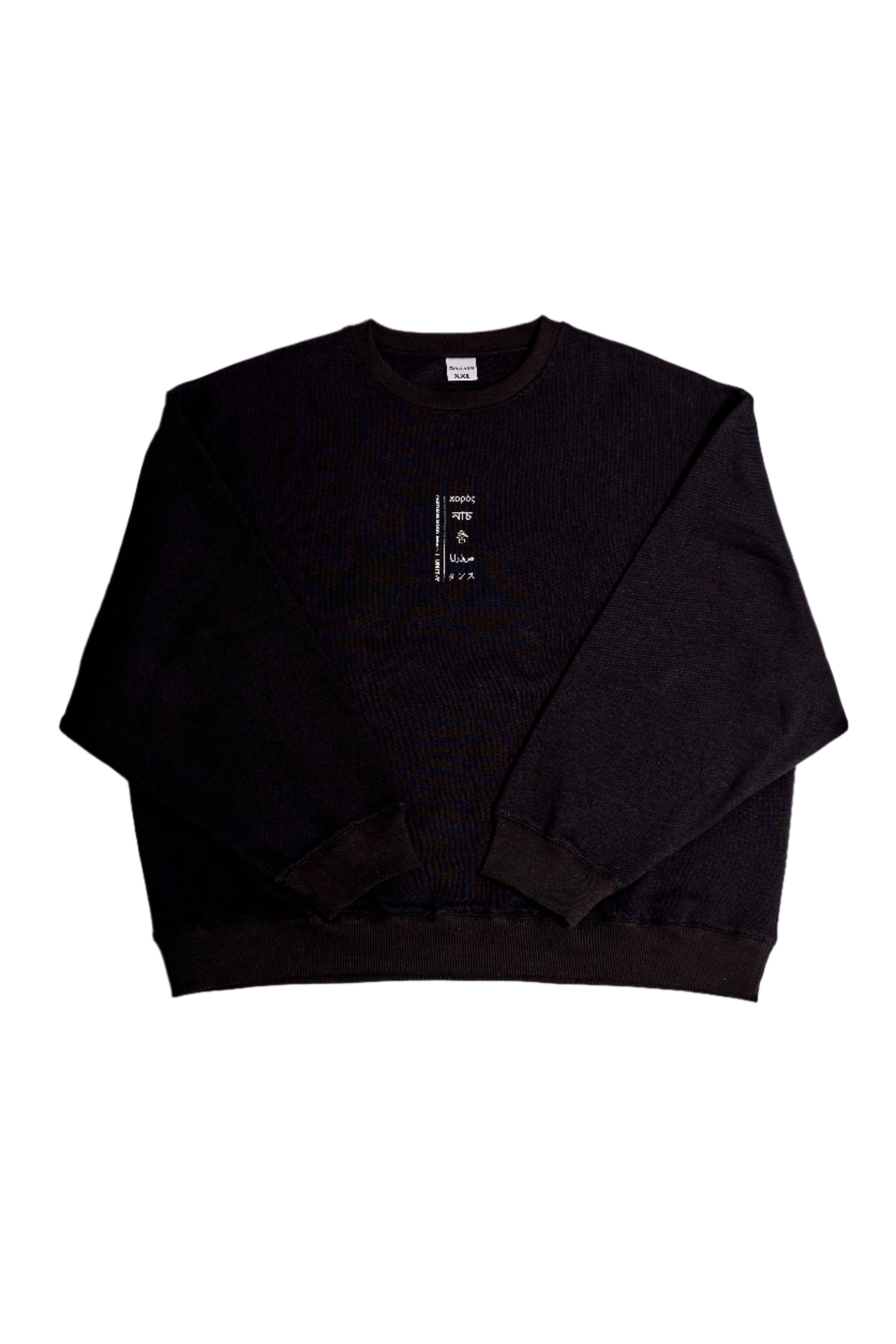 A black cotton sweater with extra wide sleeves, displayed on a white background.