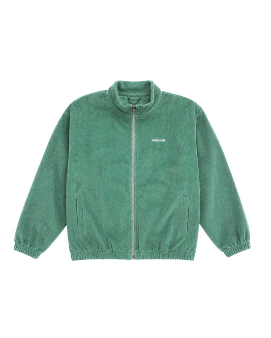 Green corduroy jacket of Berlin club fashion brand Tanzform on top of white background