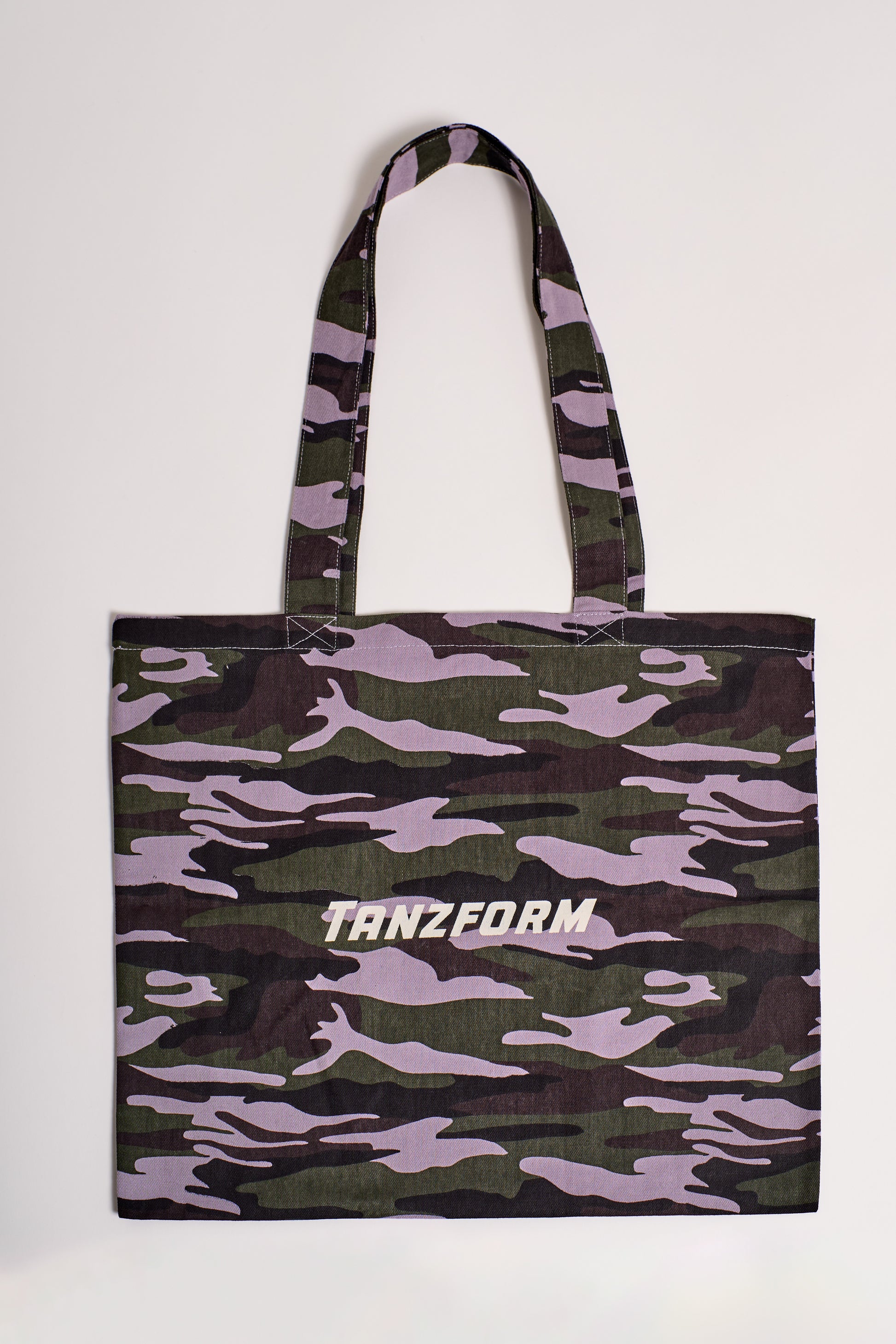 tote bag with camo print and brand logo